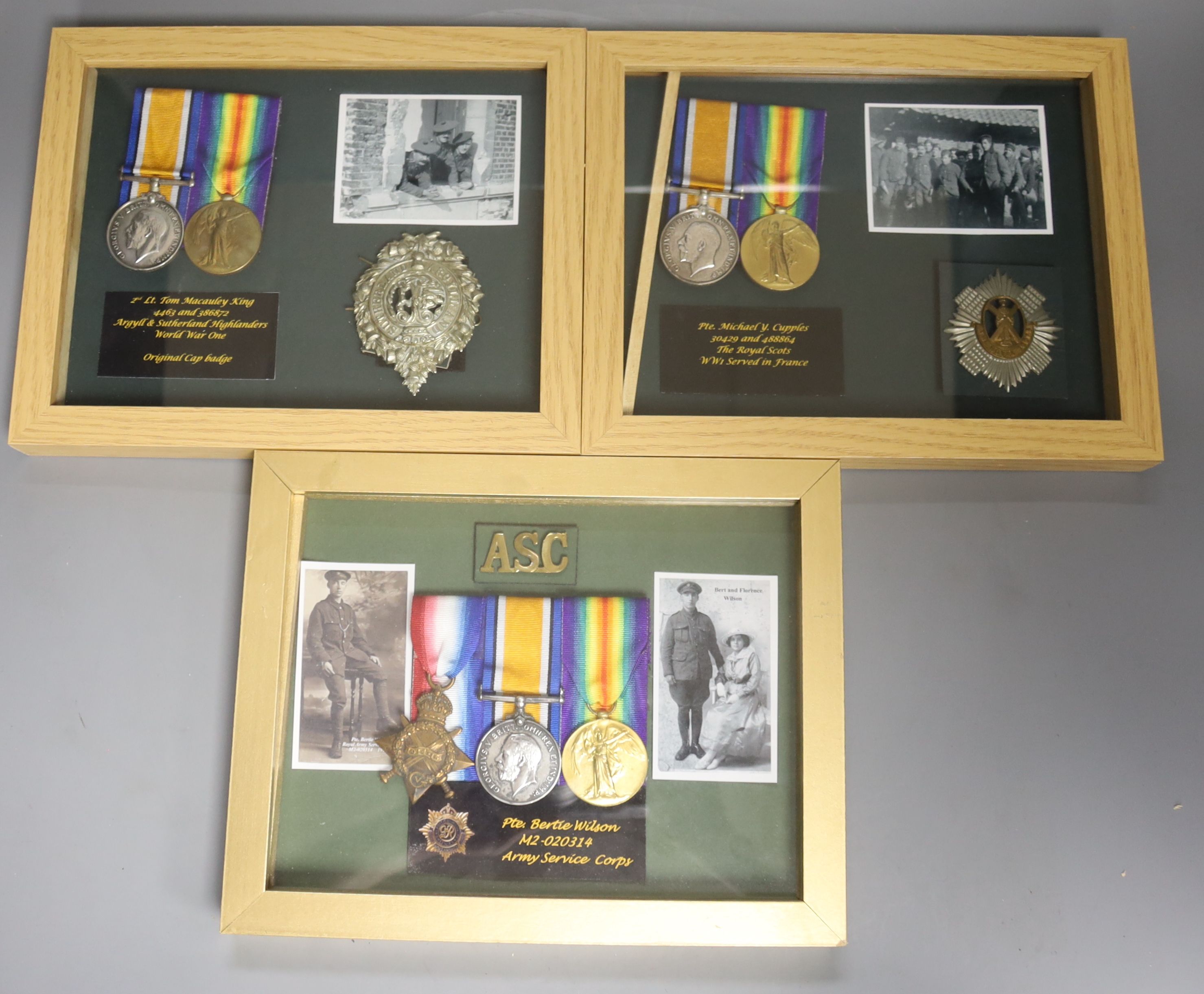 Three framed WW1 medal groups